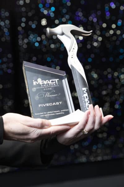 Close up of the Impact Award trophy