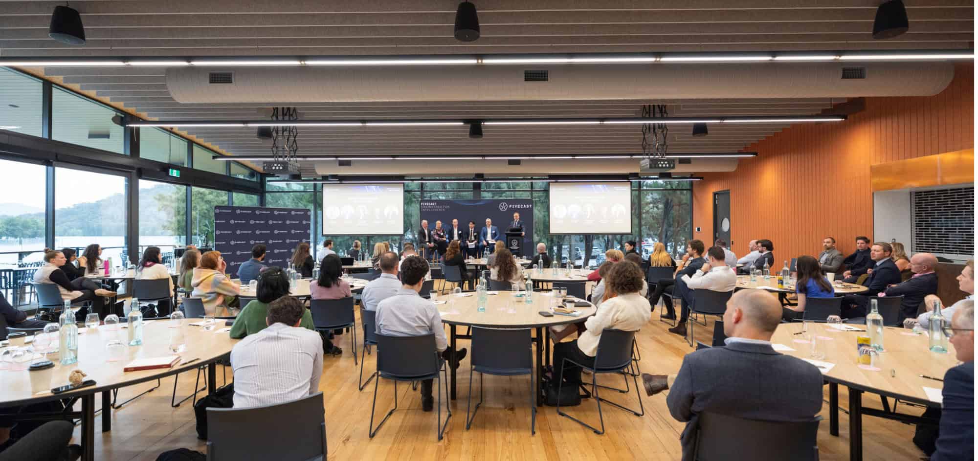 The Australian OSINT intelligence community watches a panel session on AI and OSINT capability.